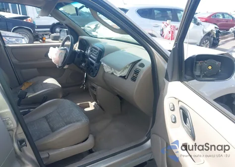 2001 Ford Escape Xls z USA, uszkodzony, nr VIN 1FMYU01141KB90949